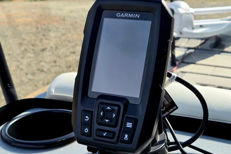 Slide: The Image of Garmin device on 2026 Tracker Bass Tracker Classic CC boat dashboard. - 16