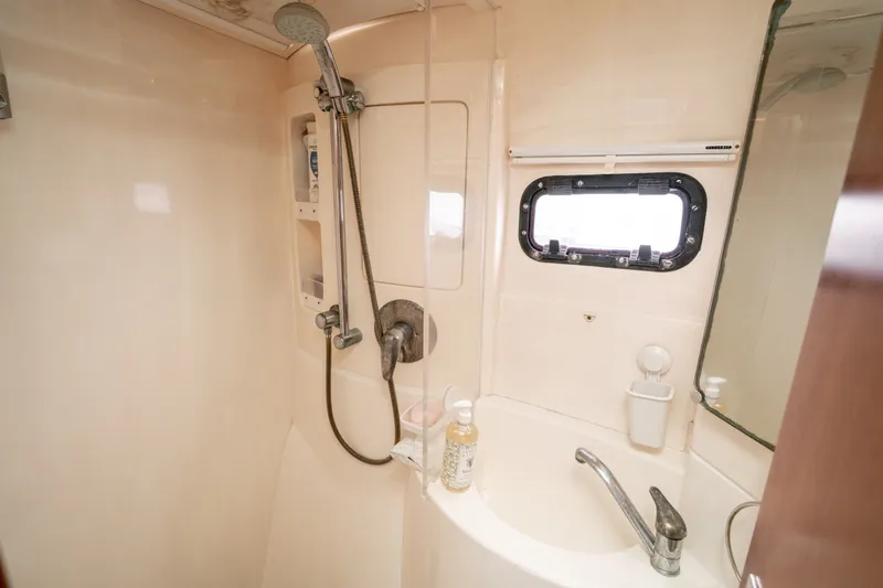 Slide: The Image of Bathroom interior of 2011 Leopard 38 yacht with shower and sink. - 91