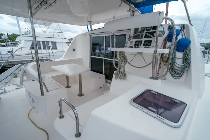 Slide: The Image of Leopard 38 catamaran cockpit with helm, seating, and nautical equipment, 2011 model. - 29