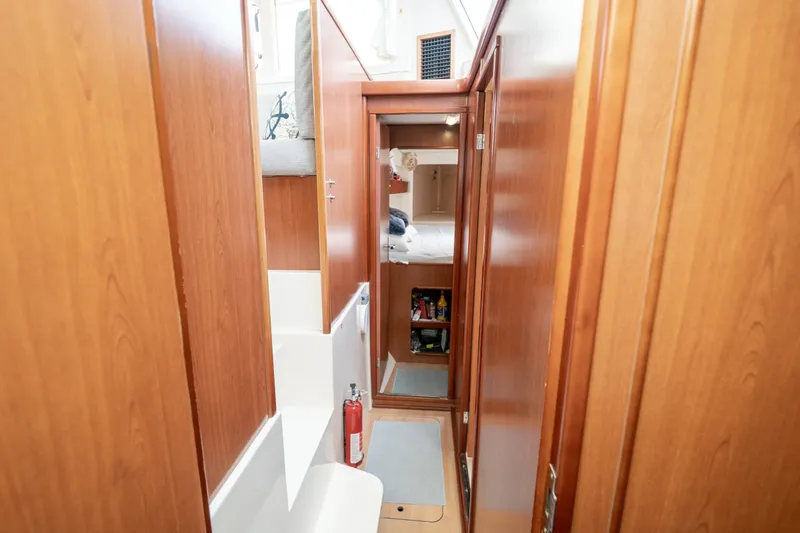 Slide: The Image of Interior of 2011 Leopard 38 yacht with wooden paneling and cozy cabin. - 125