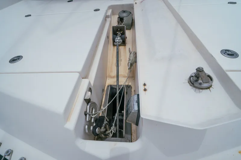 Slide: The Image of Deck equipment on a 2011 Leopard 38 catamaran, featuring winches and rigging components. - 166