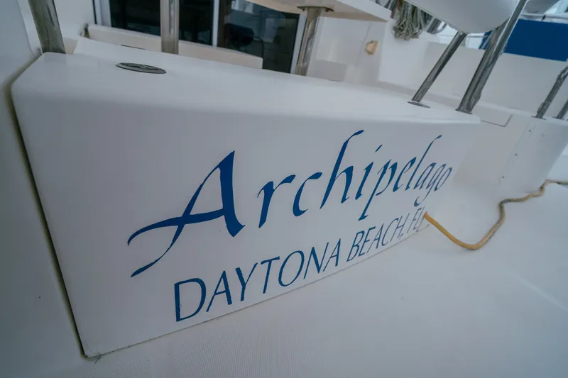 Slide: The Image of Leopard 38 catamaran named "Archipelago" docked in Daytona Beach, Florida, 2011 model. - 54