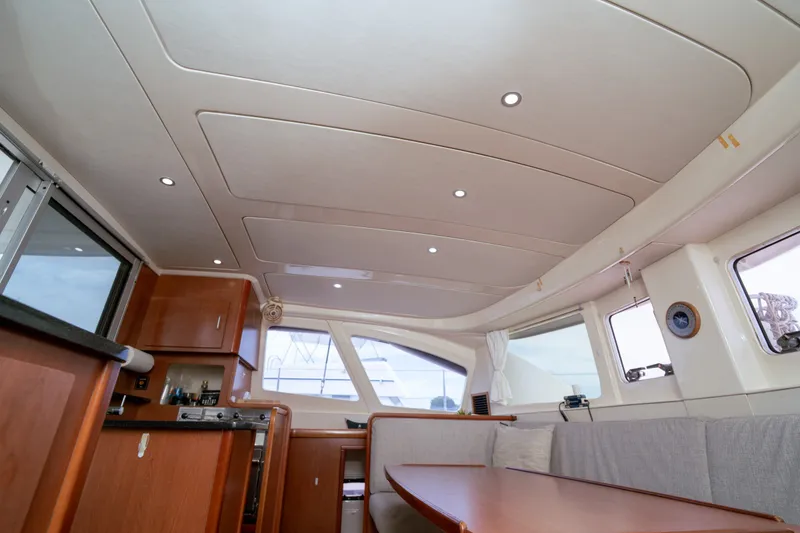 Slide: The Image of Interior of 2011 Leopard 38 yacht with modern design and comfortable seating area. - 109