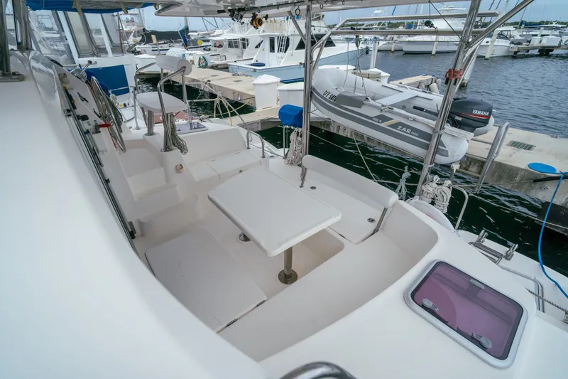 Slide: The Image of Leopard 38 catamaran cockpit, 2011 model, docked with seating and table, marina view. - 32