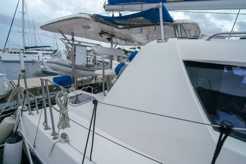Slide: The Image of 2011 Leopard 38 catamaran docked at marina with overcast sky. - 17