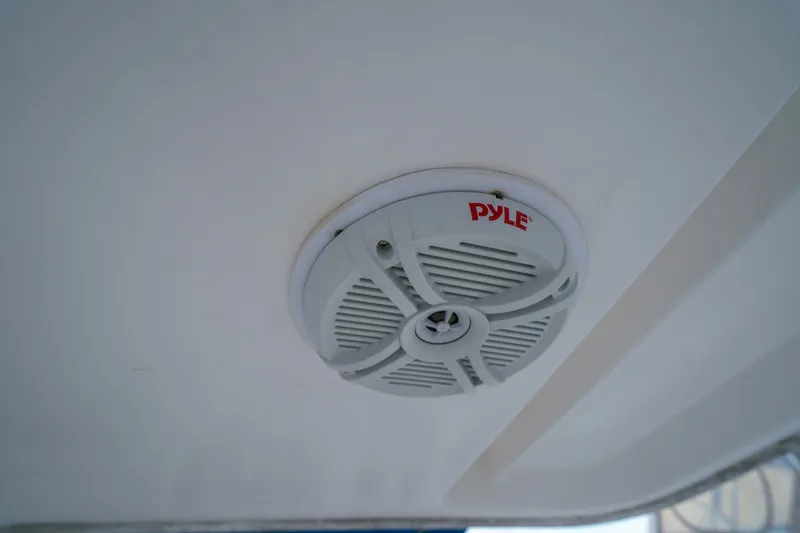 Slide: The Image of Ceiling-mounted Pyle speaker on a 2011 Leopard 38 boat. - 65