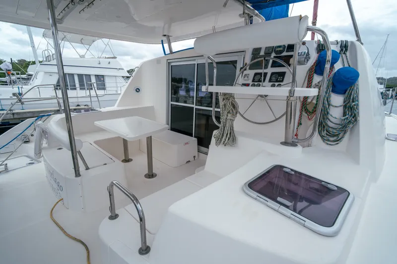 Slide: The Image of Leopard 38 catamaran cockpit with helm, seating, and ropes, 2011 model. - 30