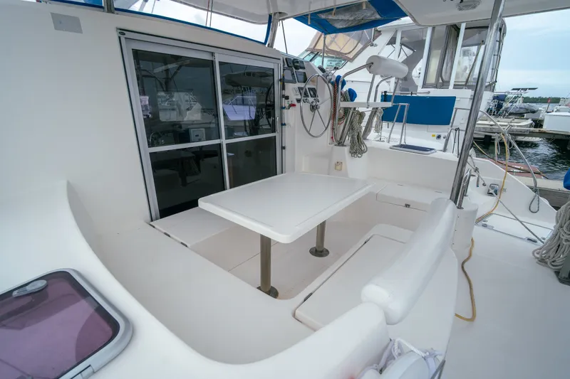 Slide: The Image of Spacious cockpit of 2011 Leopard 38 catamaran with seating and navigation equipment. - 27