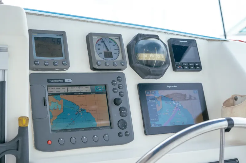 Slide: The Image of Leopard 38 yacht navigation dashboard with Raymarine instruments, 2011 model. - 67