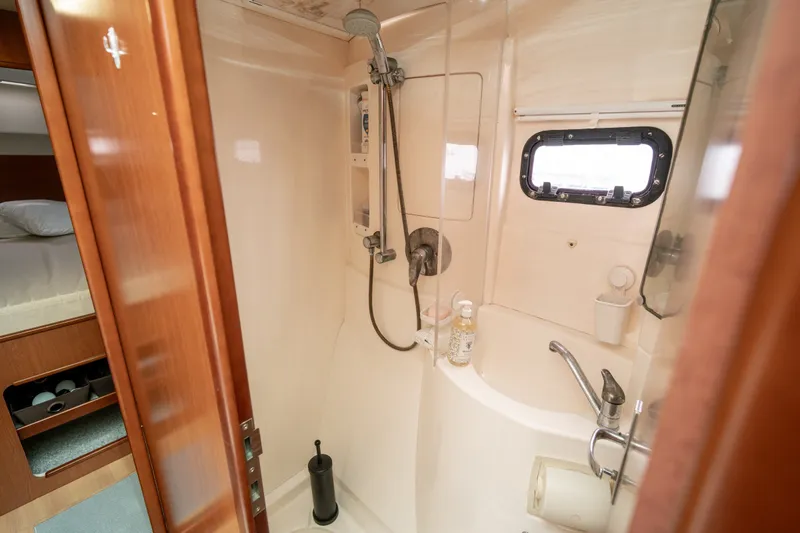 Slide: The Image of Bathroom interior of 2011 Leopard 38 yacht with shower and sink. - 92