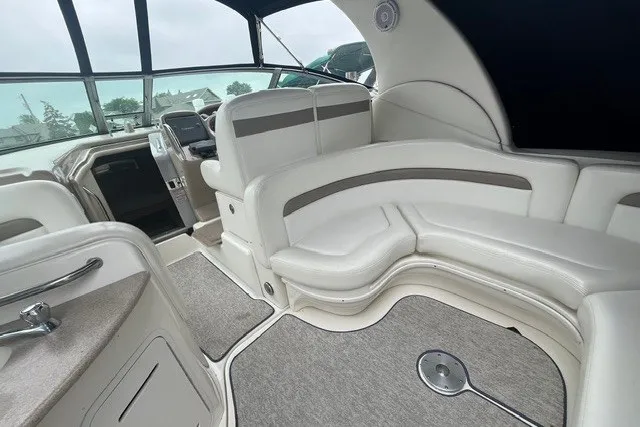 Slide: The Image of Luxurious interior of a 2004 Sea Ray Sundancer 320 yacht with plush seating. - 7
