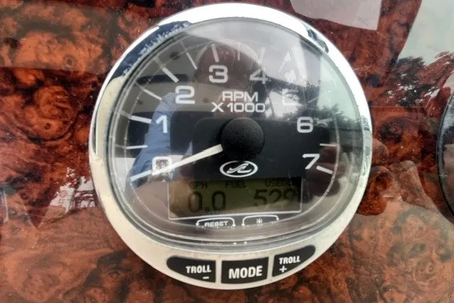 Slide: The Image of Tachometer of 2004 Sea Ray Sundancer 320 displaying RPM and fuel usage. - 16