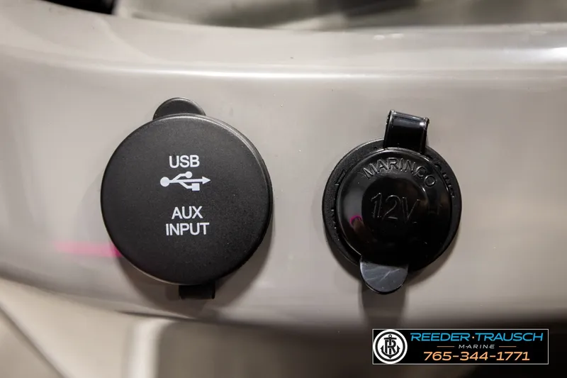 Slide: The Image of USB and 12V input ports on 2021 Avalon EXCALIBUR boat dashboard. - 33