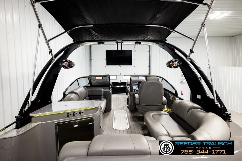 Slide: The Image of Luxurious 2021 Avalon EXCALIBUR boat interior with plush seating and modern amenities. - 29