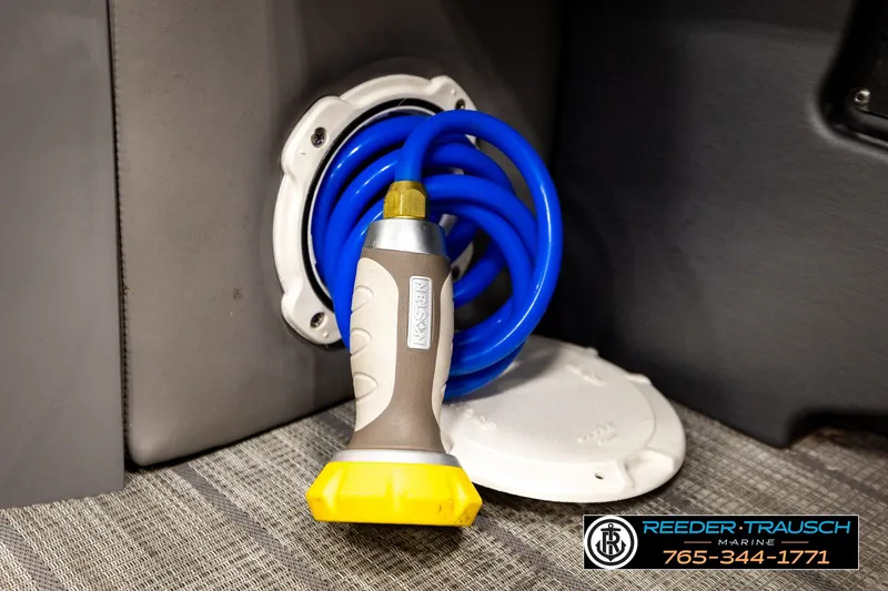 Slide: The Image of Coiled blue hose with nozzle in Avalon EXCALIBUR 2021 boat interior. - 47