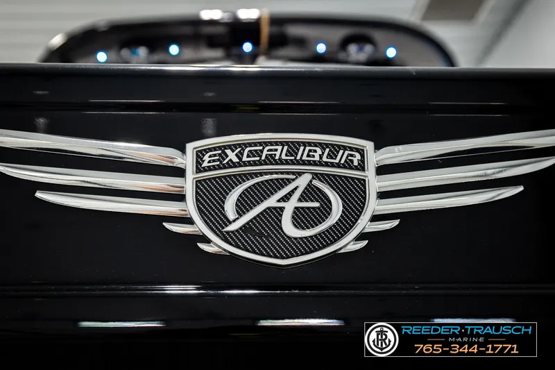 Slide: The Image of 2021 Avalon EXCALIBUR logo on black surface, featuring sleek silver wings. - 59