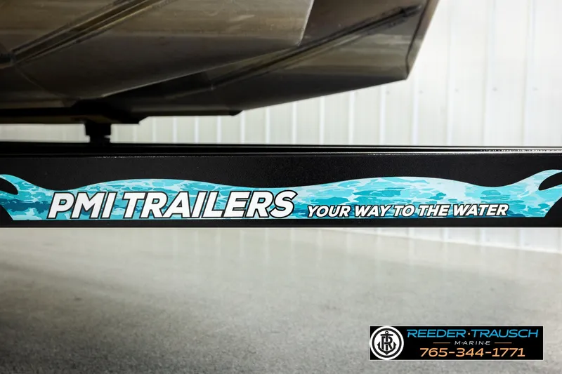 Slide: The Image of PMI Trailers branding on Avalon EXCALIBUR 2021, Reeder Trausch Marine contact details visible. - 56