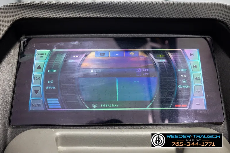Slide: The Image of Dashboard display of a 2021 Avalon EXCALIBUR boat with various controls and indicators. - 35
