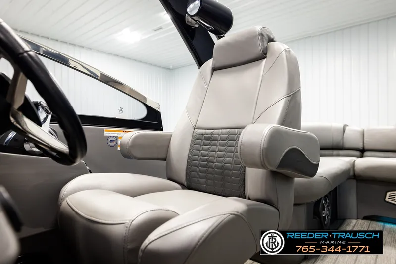 Slide: The Image of Luxurious interior of 2021 Avalon EXCALIBUR boat with premium seating and steering wheel. - 40