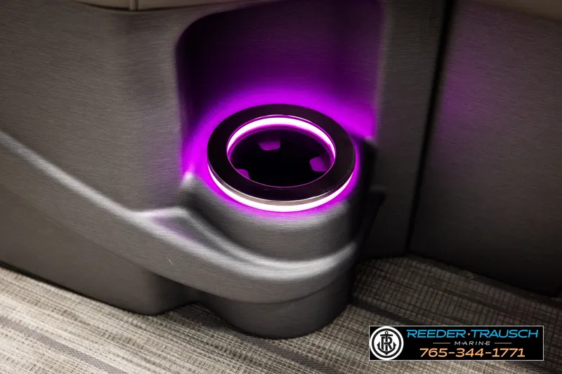 Slide: The Image of Illuminated cup holder in 2021 Avalon EXCALIBUR boat interior with purple LED lighting. - 45