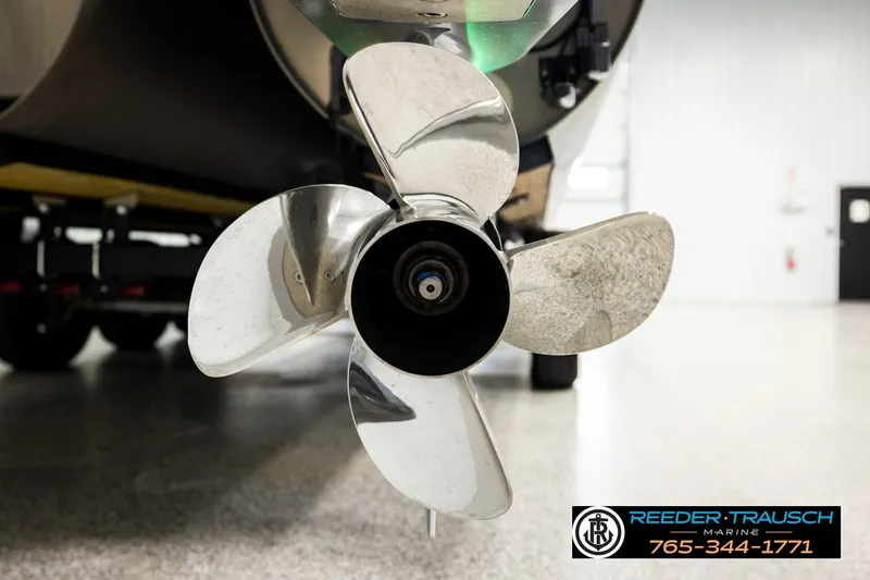 Slide: The Image of Close-up of a 2021 Avalon EXCALIBUR boat propeller in a showroom. - 55