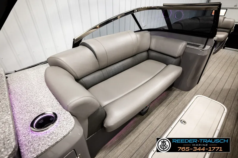 Slide: The Image of Luxurious seating on 2021 Avalon EXCALIBUR boat with modern design and cup holder. - 20