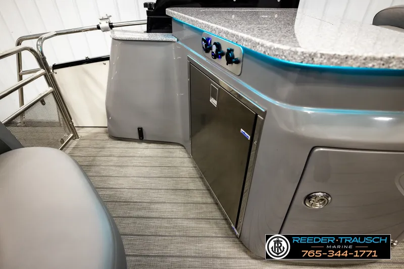Slide: The Image of 2021 Avalon EXCALIBUR boat interior with sleek countertop and modern amenities. - 26