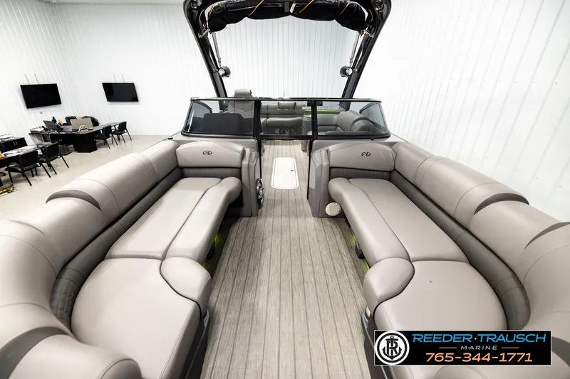 Slide: The Image of 2021 Avalon EXCALIBUR boat interior with luxurious seating and modern design. - 13