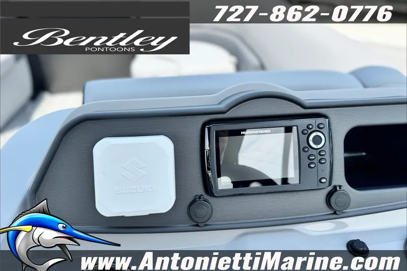 Slide: The Image of Dashboard of 2027 Bentley Pontoons Bolt 223 with Humminbird display and Suzuki logo. - 14