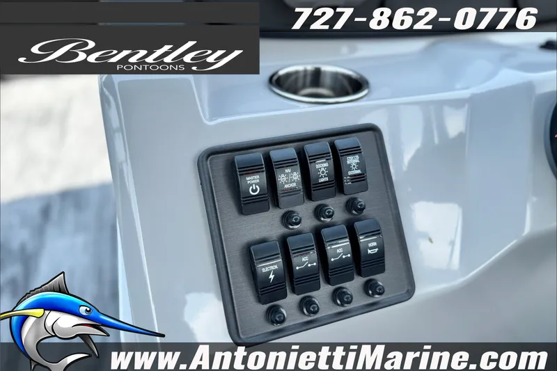 Slide: The Image of Control panel of 2027 Bentley Pontoons Bolt 223 with switches and branding. - 15