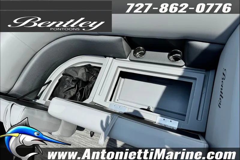 Slide: The Image of Interior of 2027 Bentley Pontoons Bolt 223 with storage compartment and cup holders. - 19