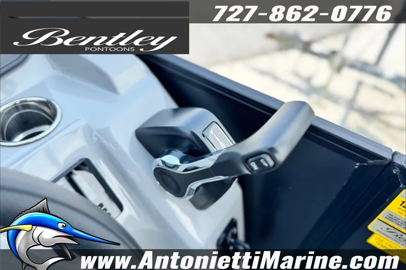 Slide: The Image of Control panel of 2027 Bentley Pontoons Bolt 223 with throttle lever, contact info displayed. - 17
