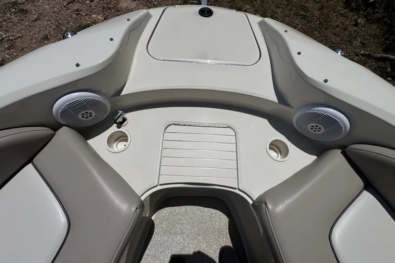 Slide: The Image of 2003 Searay 270 Sundeck boat interior with speakers and seating area. - 26