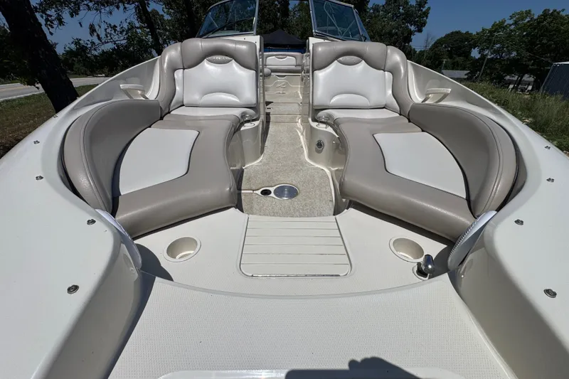 Slide: The Image of 2003 Searay 270 Sundeck boat interior with spacious seating and elegant design. - 22
