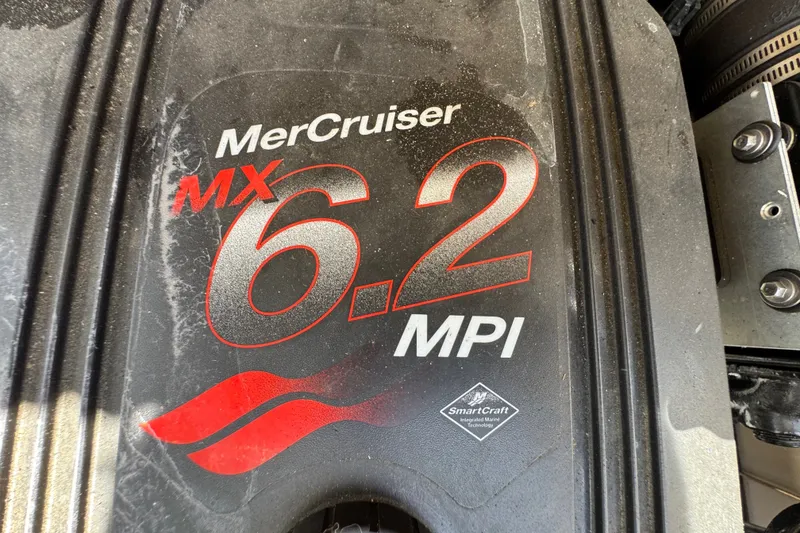 Slide: The Image of MerCruiser MX 6.2 MPI engine cover on 2003 Searay 270 Sundeck boat. - 29