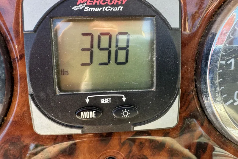 Slide: The Image of Mercury SmartCraft display showing 398 hours on a 2003 Searay 270 Sundeck boat. - 35