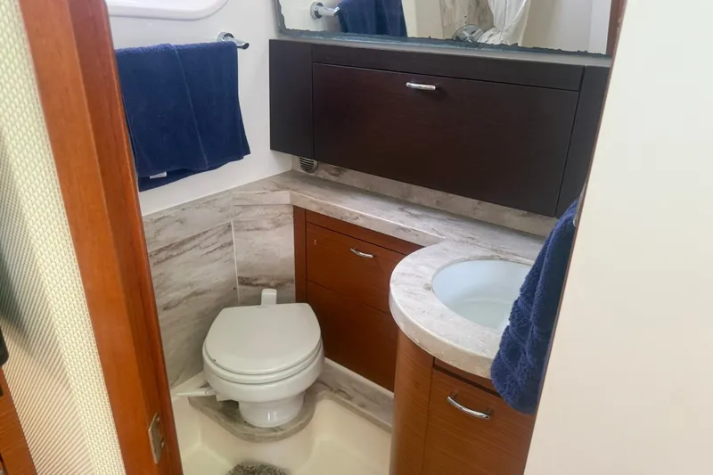 Slide: The Image of Luxurious bathroom in 2017 Pursuit S 408 Sport boat with modern fixtures. - 45