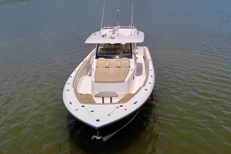 Slide: The Image of 2017 Pursuit S 408 Sport boat on calm water, aerial view. - 12