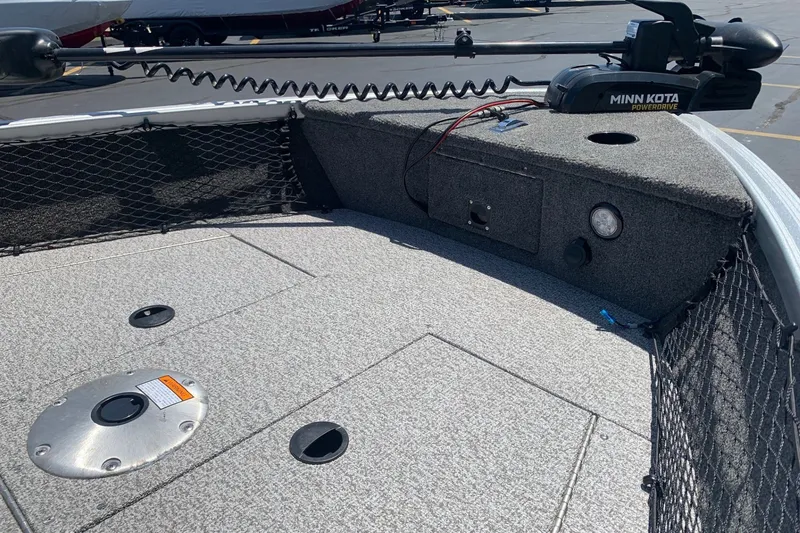 Slide: The Image of 2024 Alumacraft Classic 165 SC boat deck with Minn Kota trolling motor. - 7