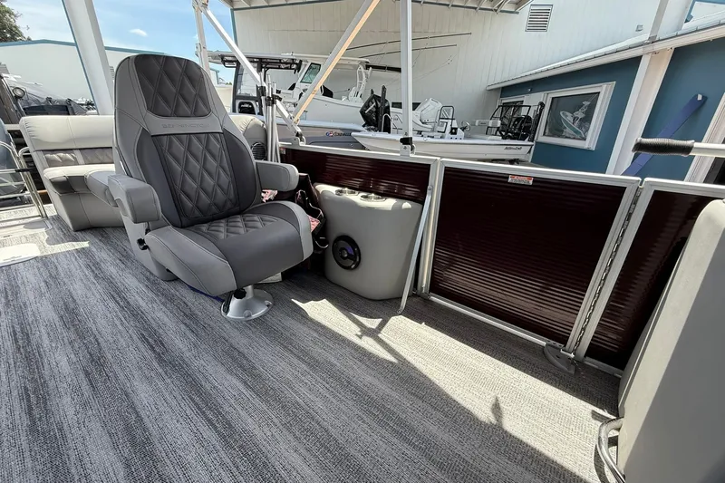 Slide: The Image of 2023 Bennington 23 LXFB boat interior with luxurious seating and modern design. - 20