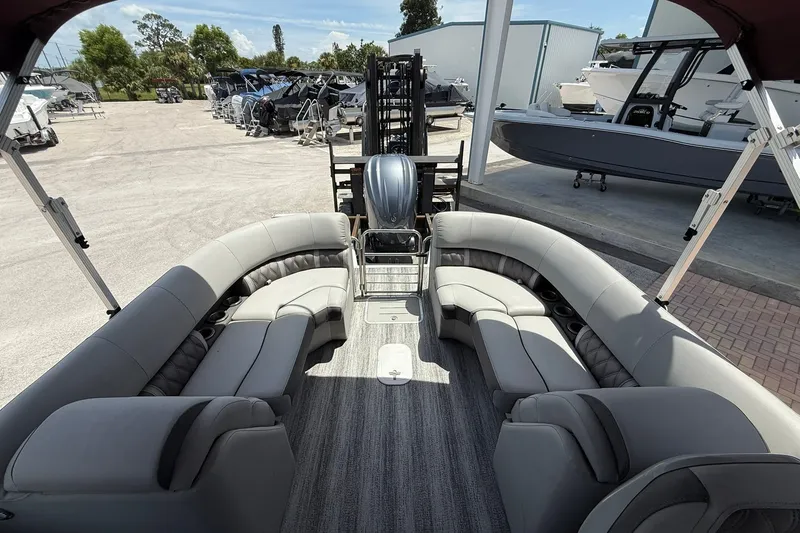 Slide: The Image of 2023 Bennington 23 LXFB pontoon boat with spacious seating and modern design. - 12