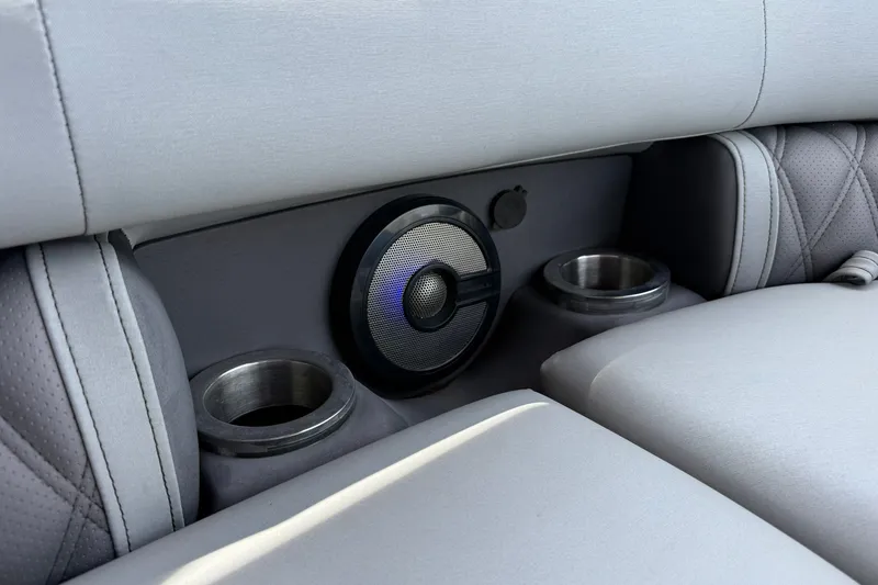 Slide: The Image of 2023 Bennington 23 LXFB boat interior with speaker and cup holders. - 28