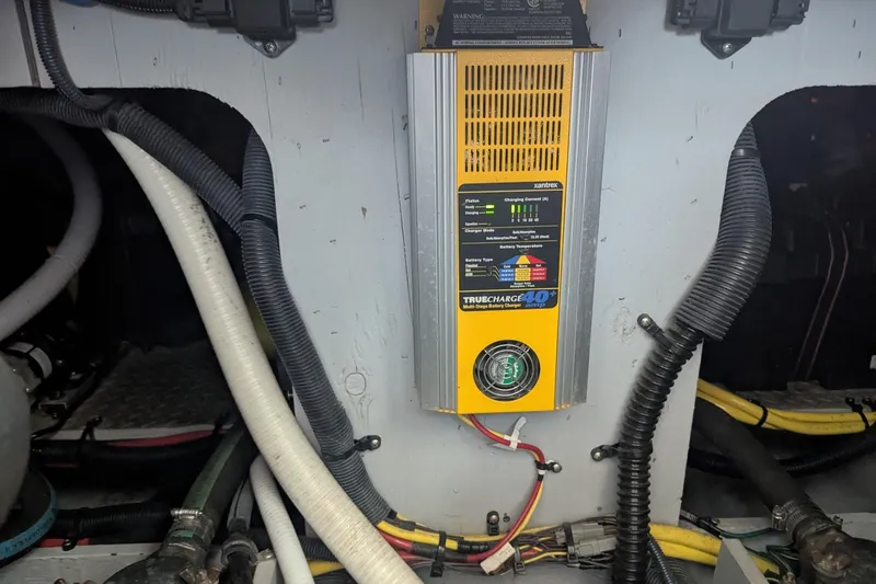 Slide: The Image of Battery charger in 2006 Meridian 341 Sedan engine room with cables and wiring. - 41