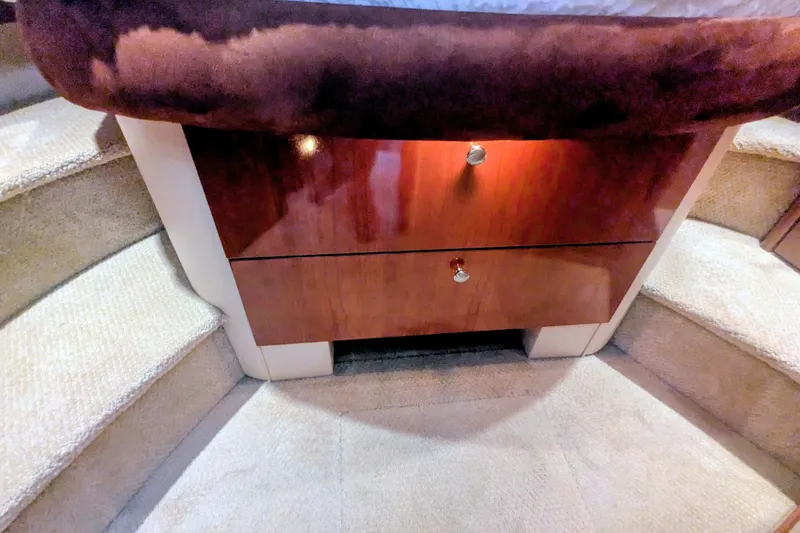 Slide: The Image of Interior of 2006 Meridian 341 Sedan with wooden drawers and carpeted steps. - 32