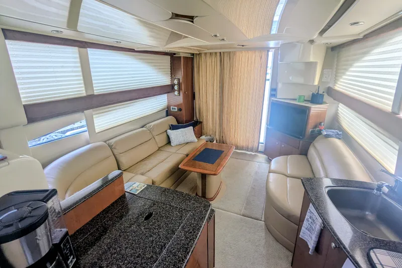 Slide: The Image of Interior of 2006 Meridian 341 Sedan yacht with luxurious seating and modern amenities. - 22