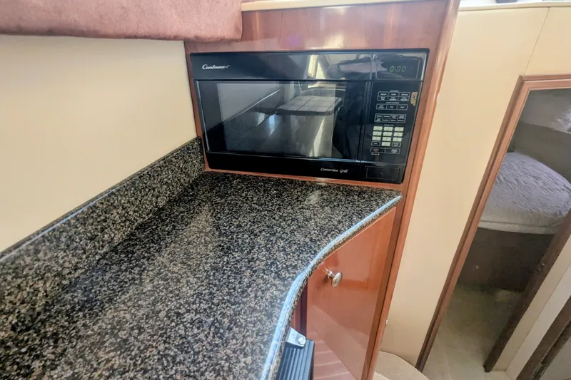 Slide: The Image of 2006 Meridian 341 Sedan interior with granite countertop and built-in microwave. - 27