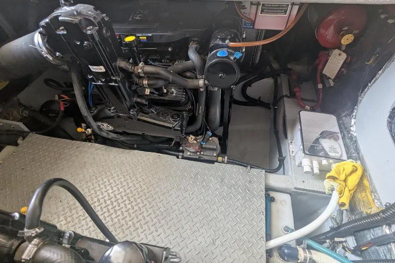 Slide: The Image of Engine room of a 2006 Meridian 341 Sedan with visible components and wiring. - 38