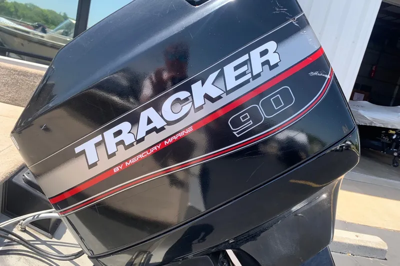 Slide: The Image of Tracker 90 outboard motor on a 2005 Targa 17 WT boat. - 5