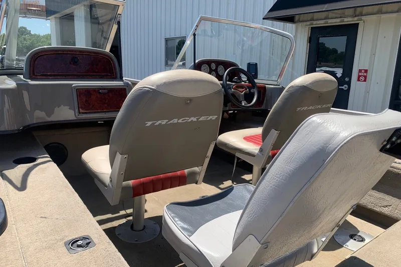 Slide: The Image of 2005 Tracker Targa 17 WT boat interior with seating and dashboard view. - 6