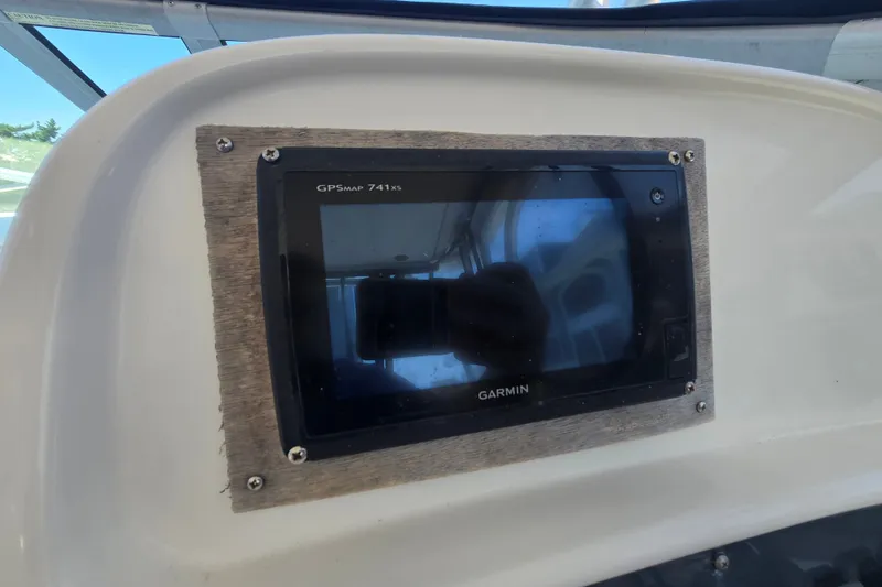 Slide: The Image of Garmin GPSMAP 741xs installed on 2006 Robalo R265 Walkaround boat dashboard. - 17